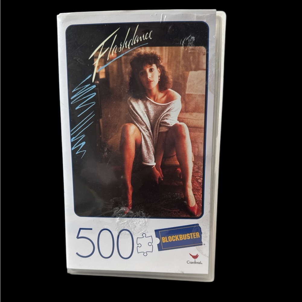 Flashdance  500 piece puzzle-Retro look in Blockbuster VHS case. (J 1 20225)